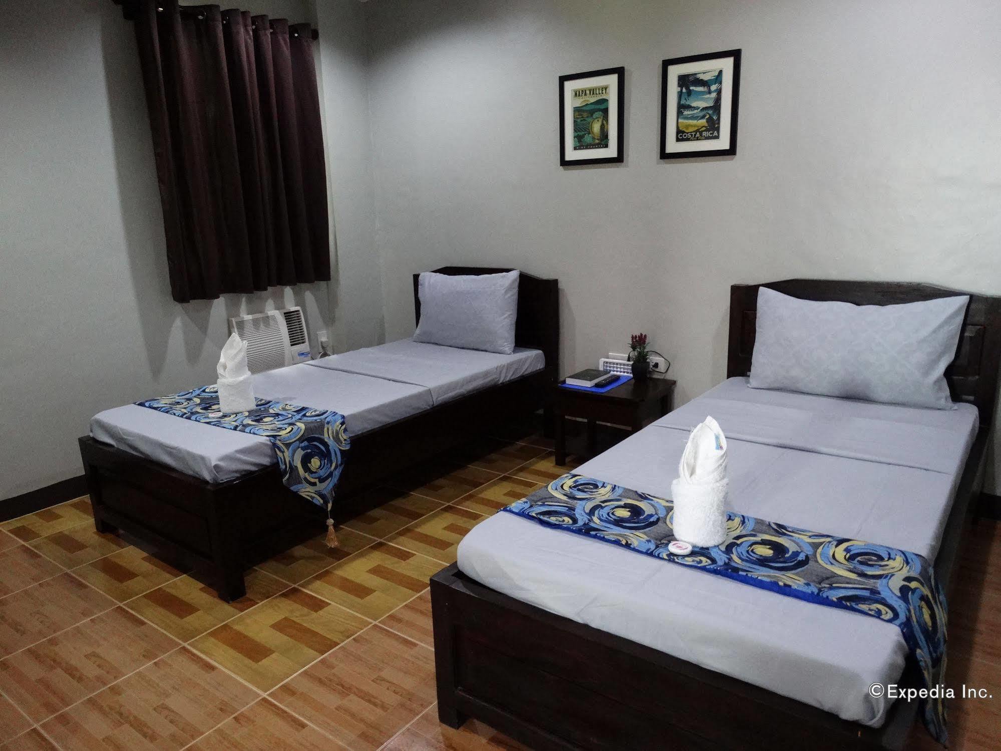 Harbour Gardens Tourist Inn Тагбиларан Экстерьер фото